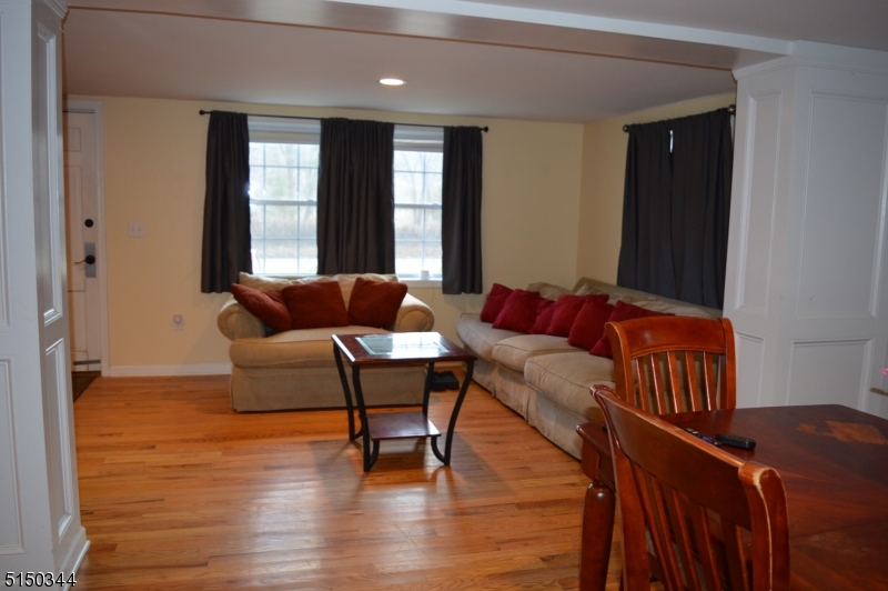 119 Green Pond Road Rockaway, NJ 07866 - Photo 7 of 14 a living room with furniture and windows