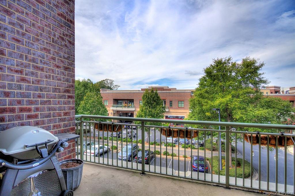 3920 Sharon Road, Unit 206 Charlotte, NC 28211 - Photo 12 of 24 a view of a balcony with chairs