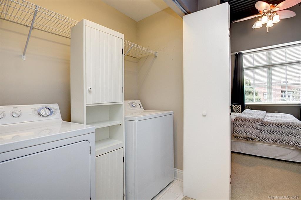 3920 Sharon Road, Unit 206 Charlotte, NC 28211 - Photo 18 of 24 a utility room with dryer and washer