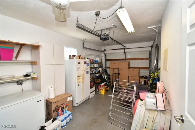 a view of gym equipment and empty room