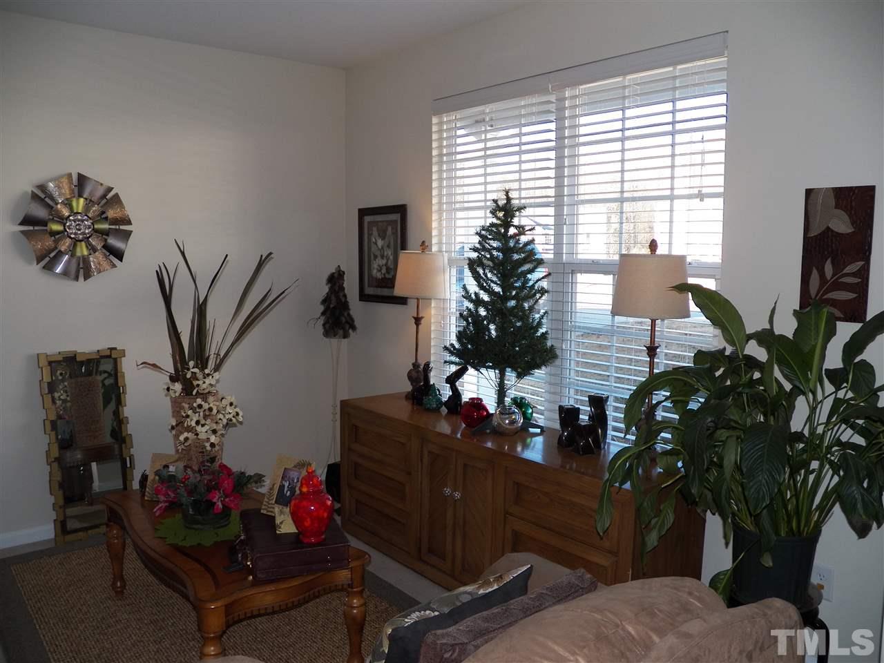 2631 Dutch Grove Circle Raleigh, NC 27610 - Photo 11 of 22 formal living room to right from hardwood foyer entry