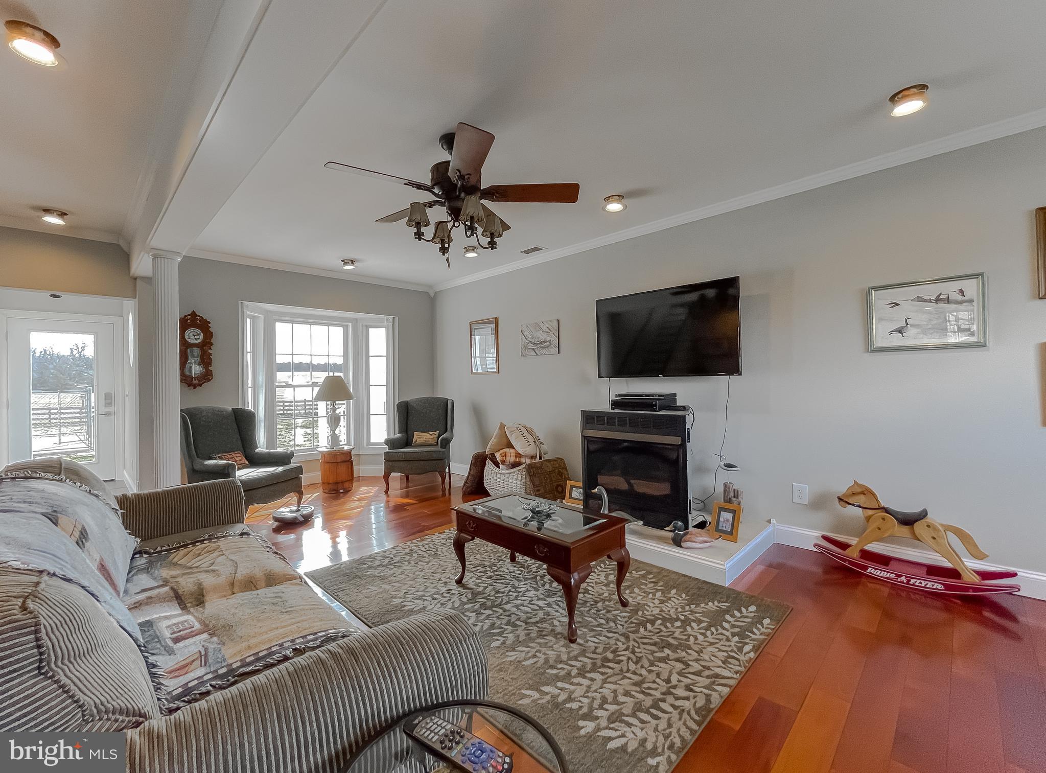 19474 Piney Point Road Valley Lee, MD 20692 - Photo 8 of 55 Living Rm with Brazilian Hardwood Floors & Gas FP