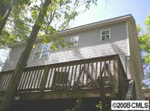 3121 Point Clear Drive Tega Cay, SC 29708 - Photo 2 of 6 a view of a wooden balcony