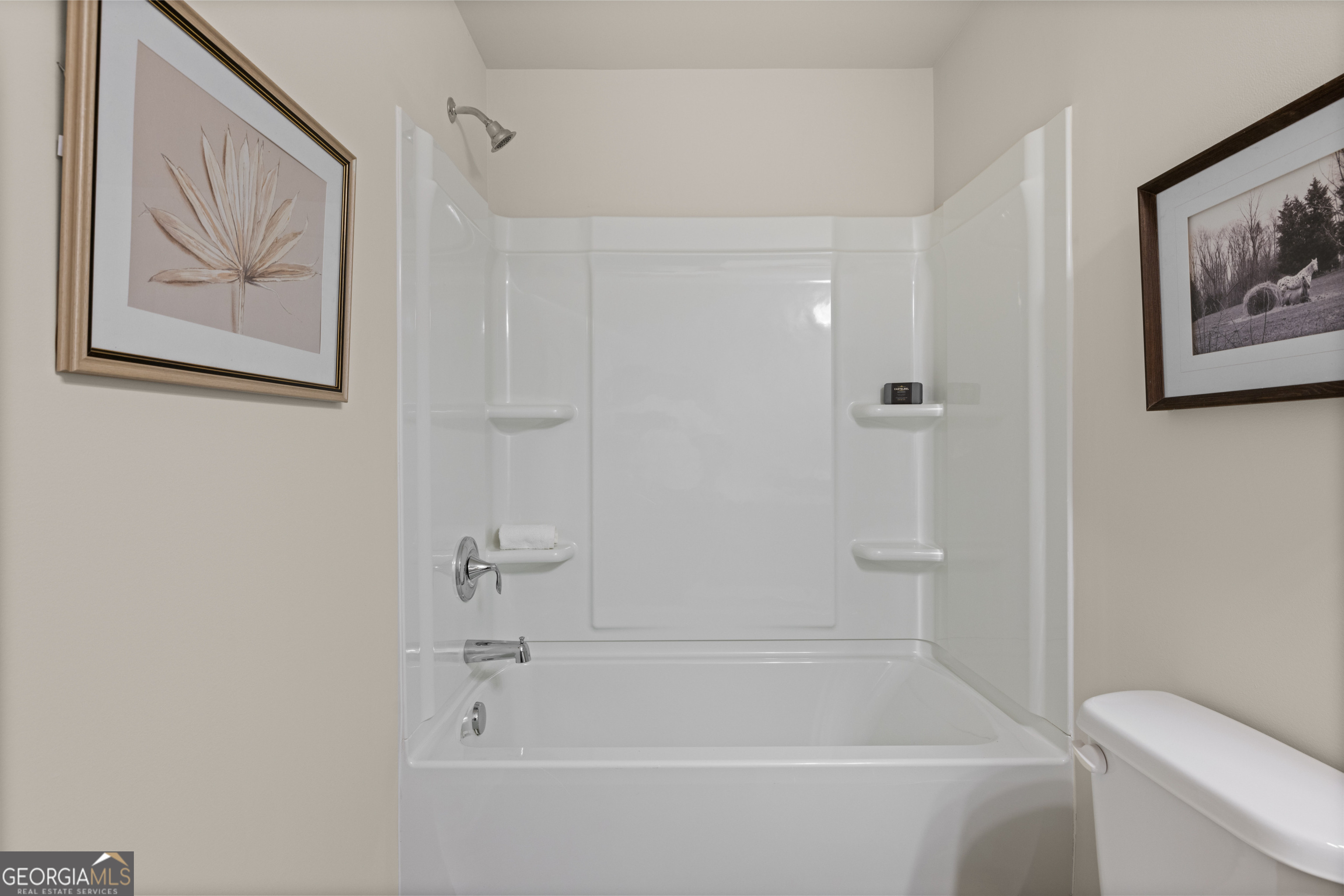 1042 Merritt Drive, Unit 22 Villa Rica, GA 30180 - Photo 17 of 24 a bathroom with a bathtub and a shower