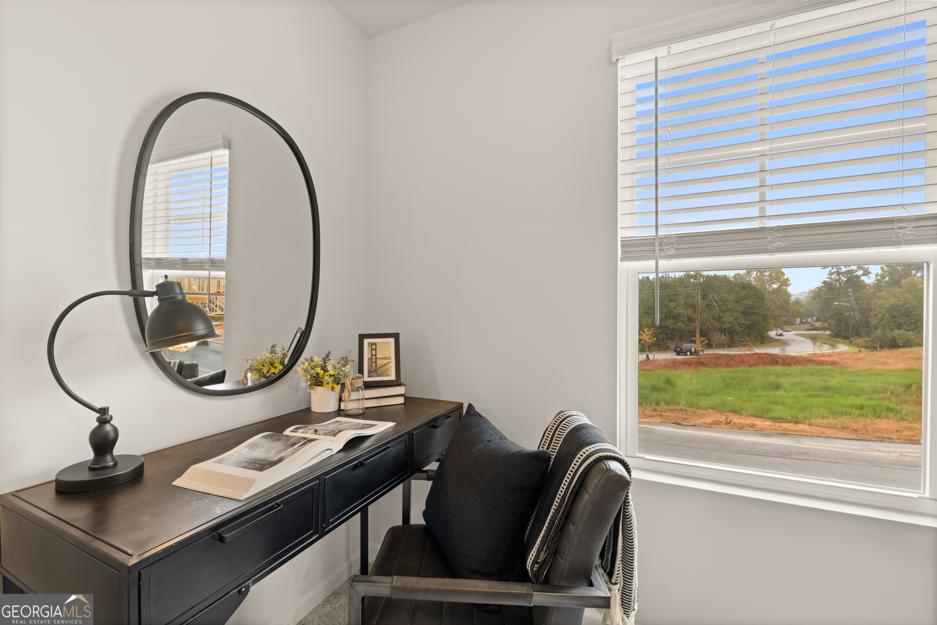 1042 Merritt Drive, Unit 22 Villa Rica, GA 30180 - Photo 19 of 24 a view of a bathroom sink and a window