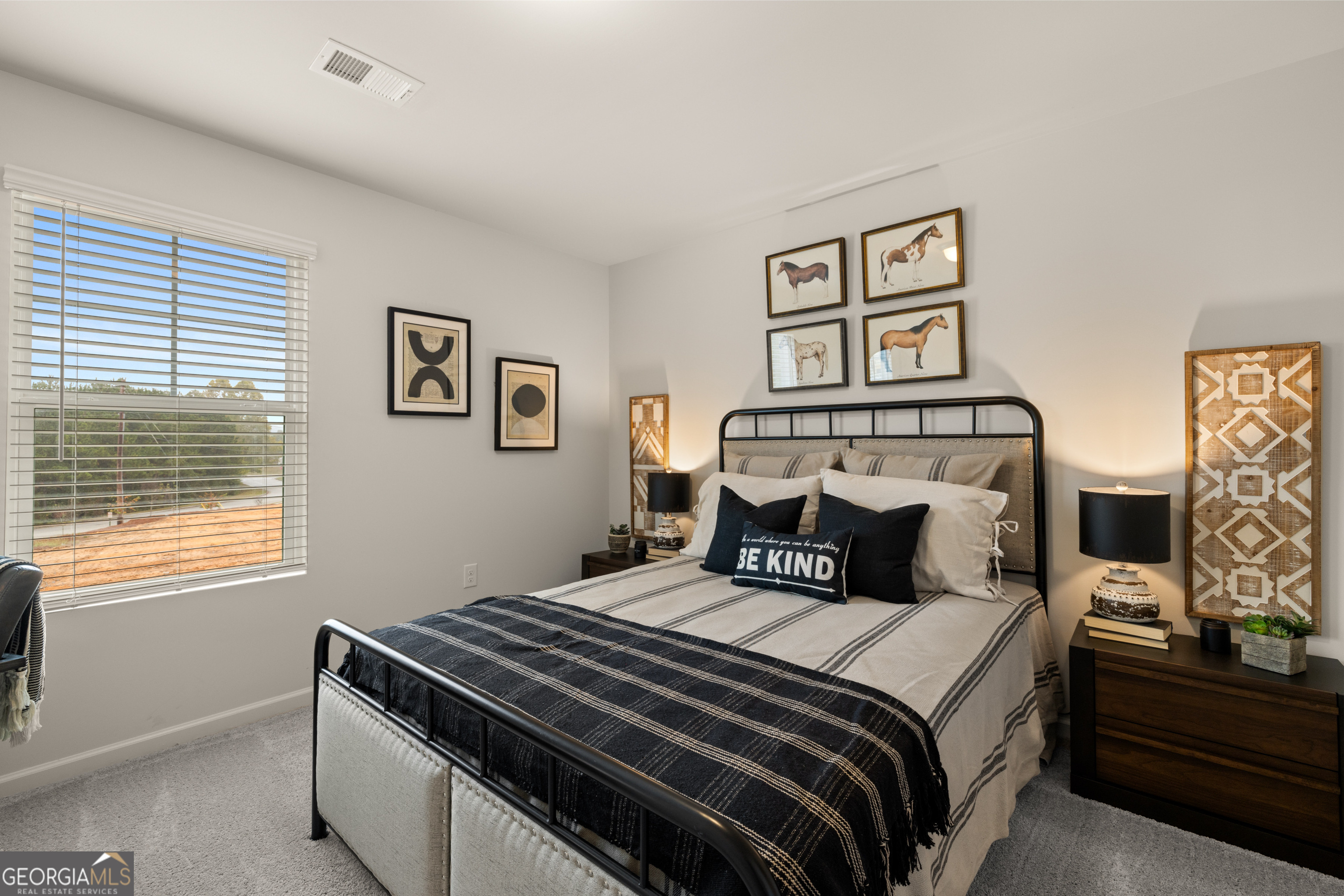 1042 Merritt Drive, Unit 22 Villa Rica, GA 30180 - Photo 20 of 24 a bedroom with a bed and a window