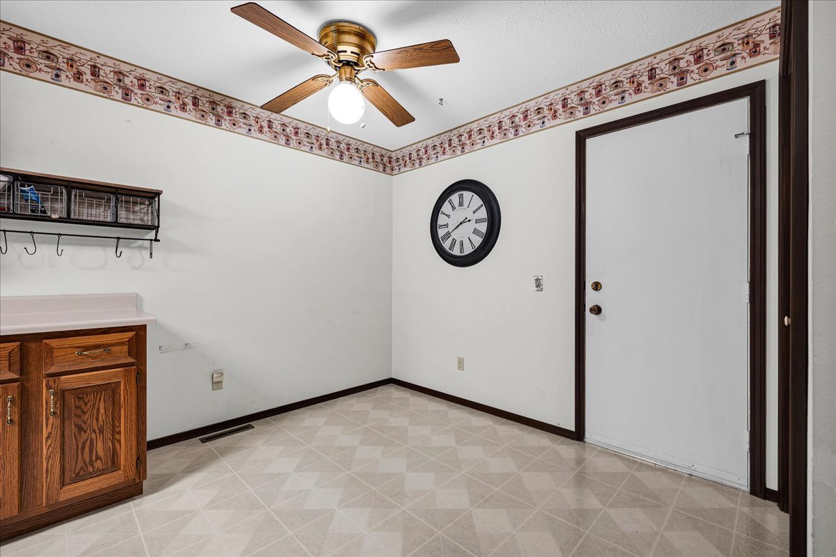 1509 Fort Jesse Road, Unit 13 Normal, IL 61761 - Photo 11 of 30 a view of a hallway with paintings on the wall