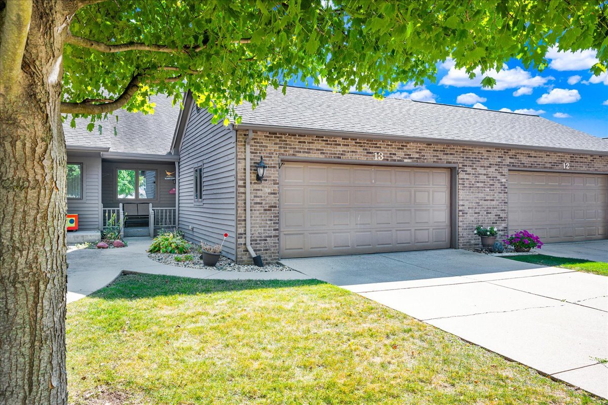 1509 Fort Jesse Road, Unit 13 Normal, IL 61761 - Photo 25 of 30 a front view of a house with garden