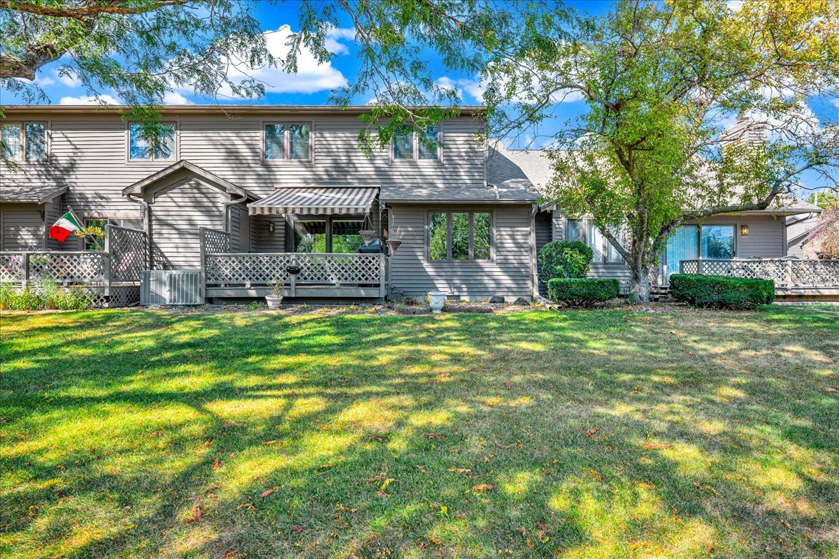 1509 Fort Jesse Road, Unit 13 Normal, IL 61761 - Photo 27 of 30 a front view of a house with garden