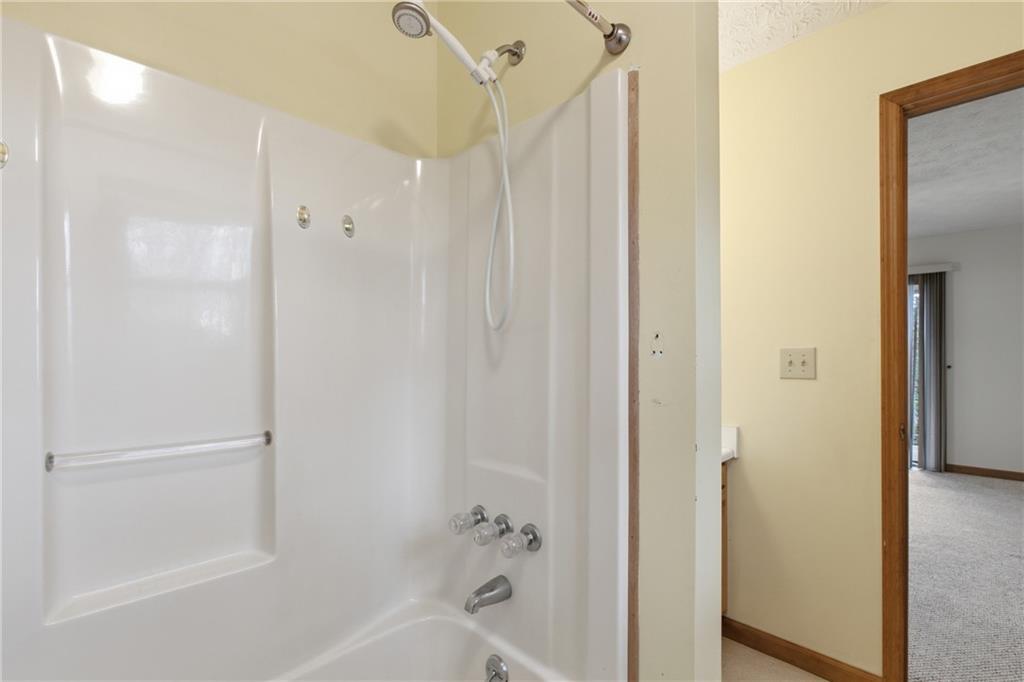143 Copperhead Road Cornelia, GA 30531 - Photo 17 of 56 a bathroom with a bathtub
