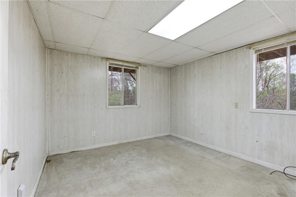 143 Copperhead Road Cornelia, GA 30531 - Photo 24 of 56 an empty room with windows