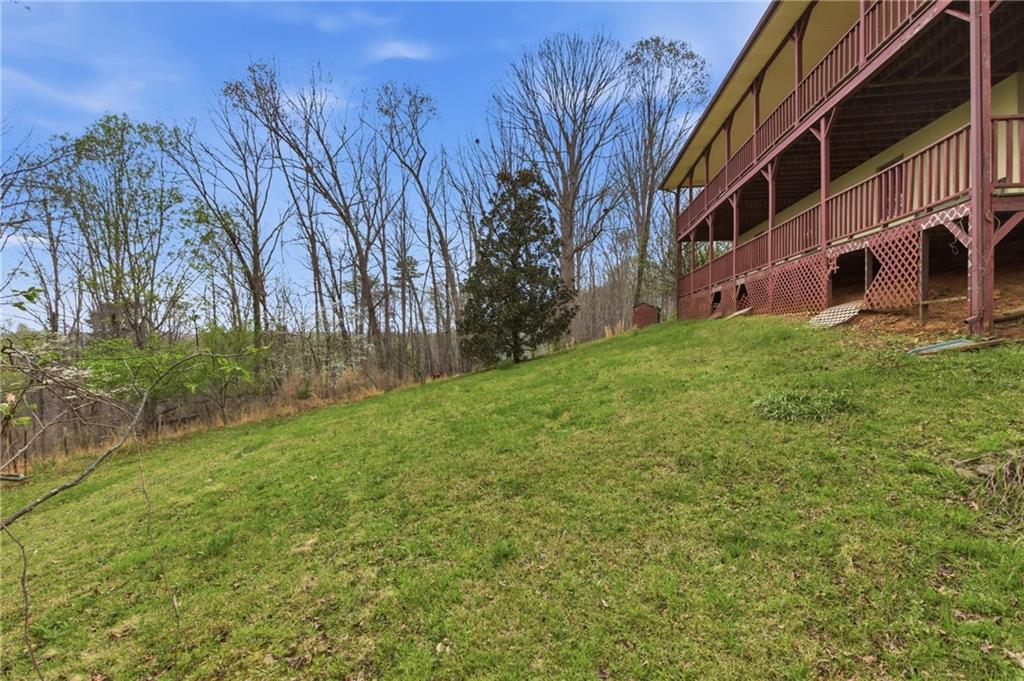 143 Copperhead Road Cornelia, GA 30531 - Photo 45 of 56 a view of a building with a yard