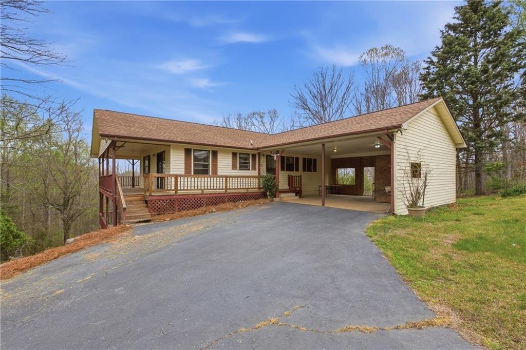 143 Copperhead Road Cornelia, GA 30531 - Photo 49 of 56 a view of a house with a patio