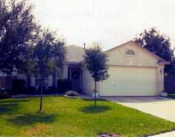 9109 Torran Cove Austin, TX 78749 - Photo 1 of 1 a front view of a house with a yard