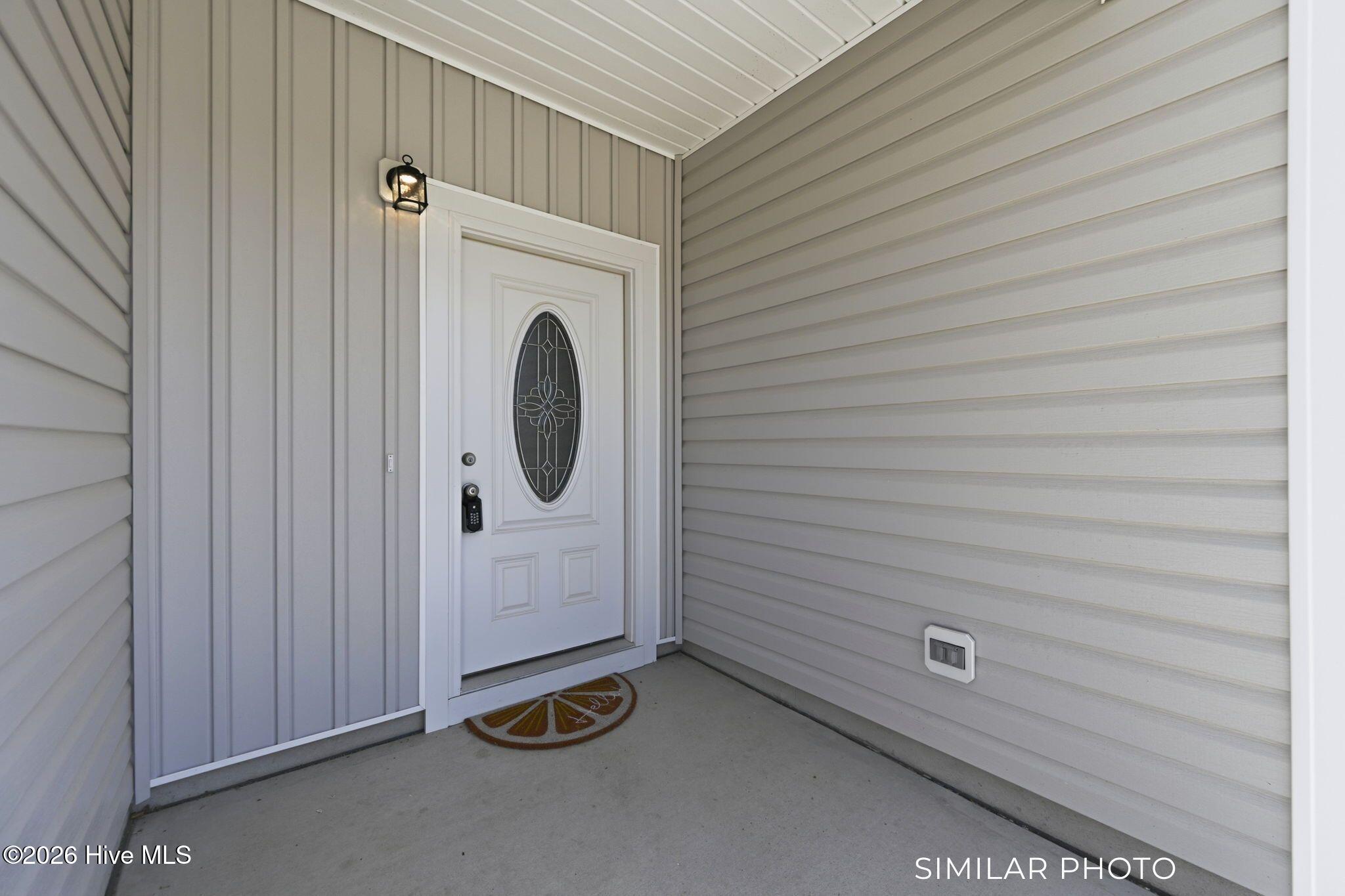 207 Holly Sands Loop Sneads Ferry, NC 28460 - Photo 4 of 45 Similar Photo - Front Door