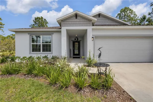 a room with windows and white walls