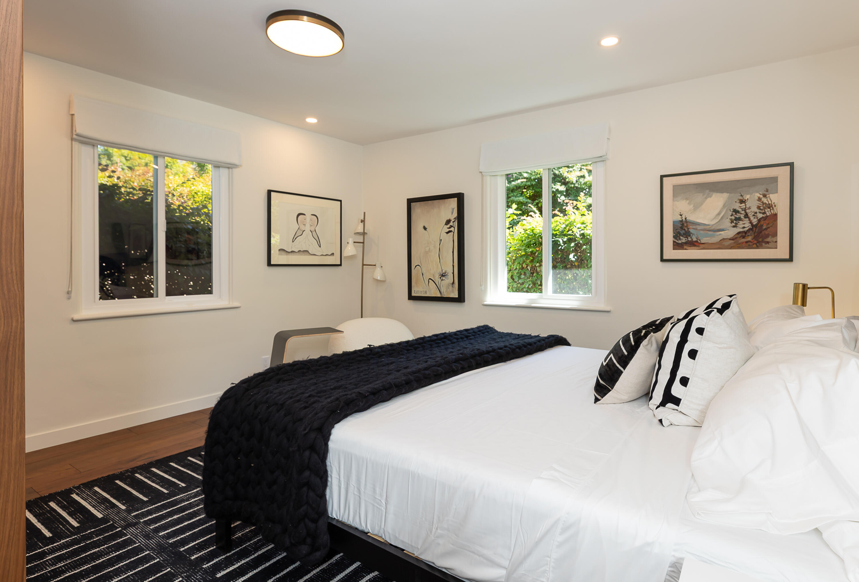2166 East Valley Road Montecito, CA 93108 - Photo 11 of 30 a bedroom with a large bed and a window
