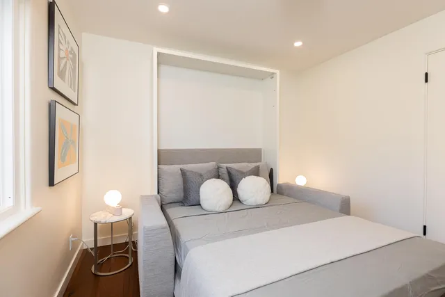 a view of a house with a potted plant