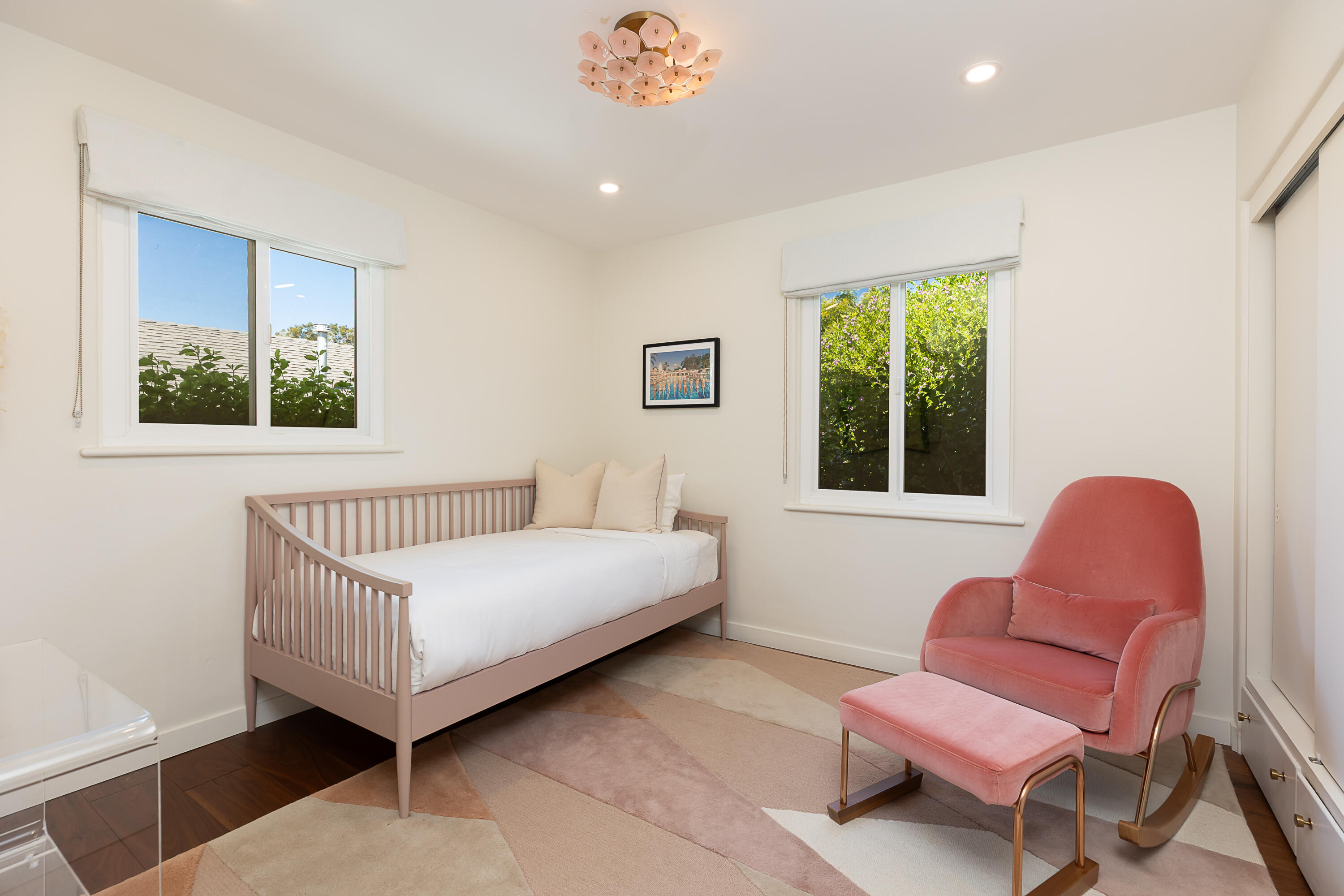 2166 East Valley Road Montecito, CA 93108 - Photo 15 of 30 a bedroom with a bed and a chair