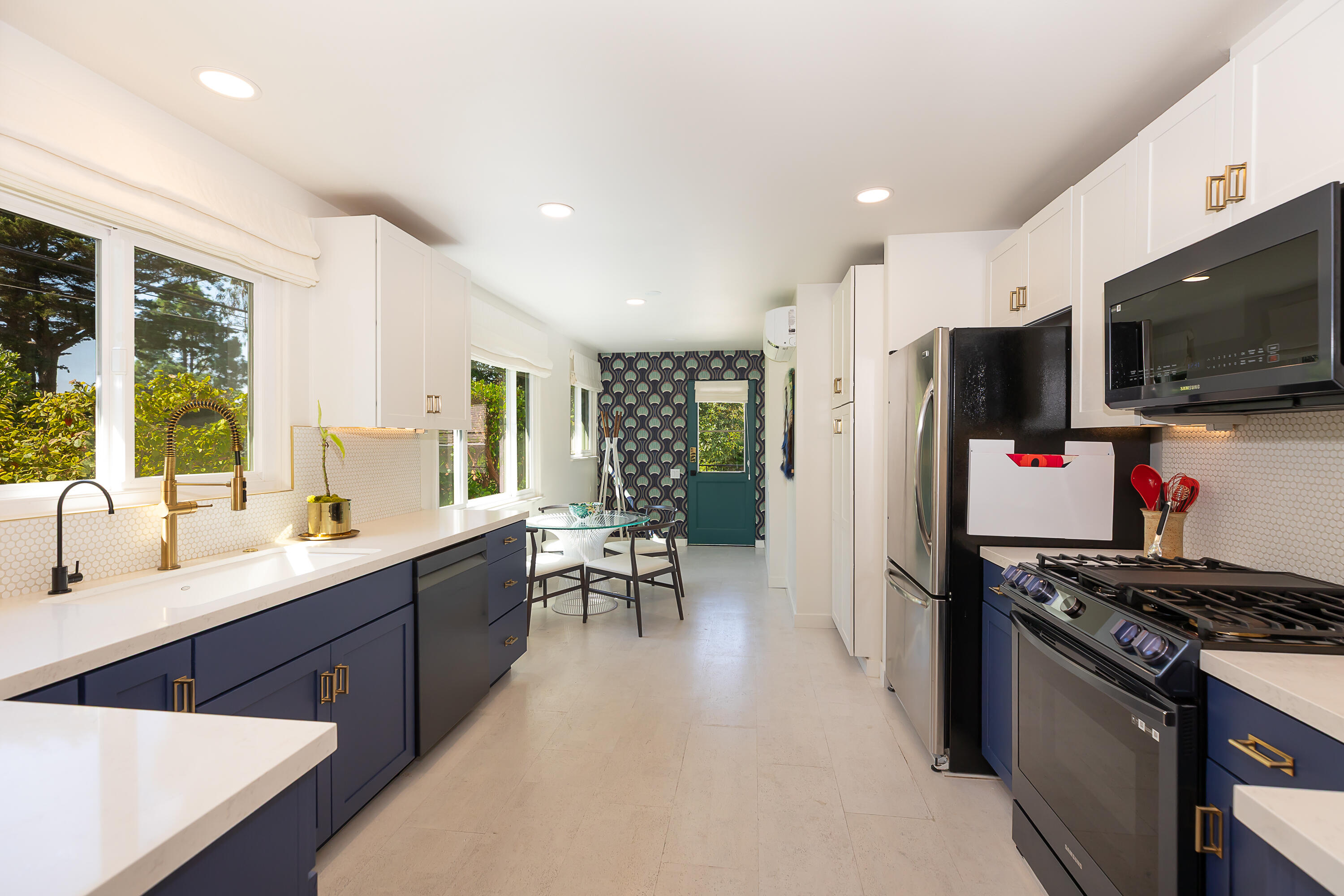 2166 East Valley Road Montecito, CA 93108 - Photo 2 of 30 a kitchen with a sink stainless steel appliances and cabinets