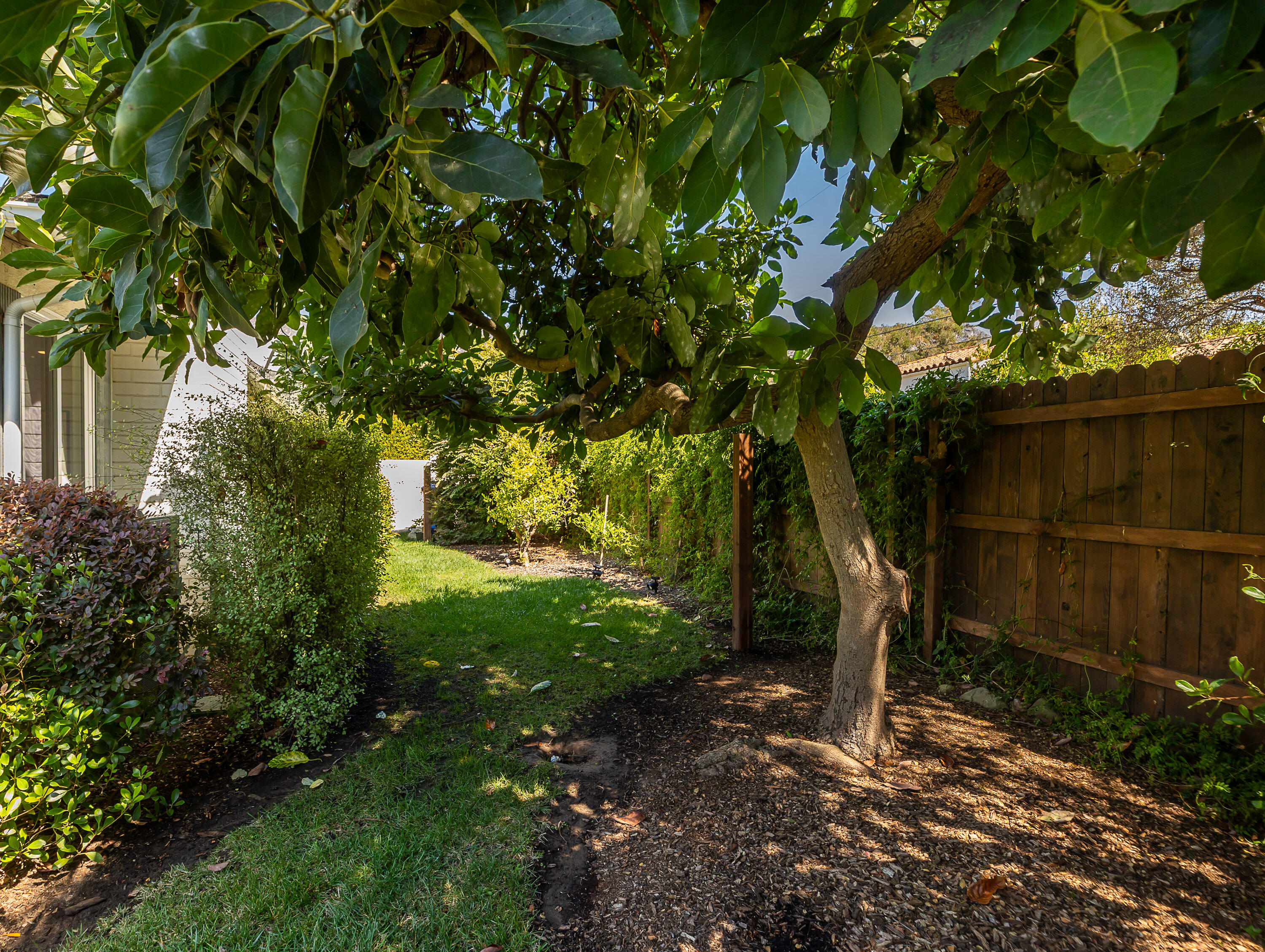 2166 East Valley Road Montecito, CA 93108 - Photo 28 of 30 a backyard of a house with lots of green space