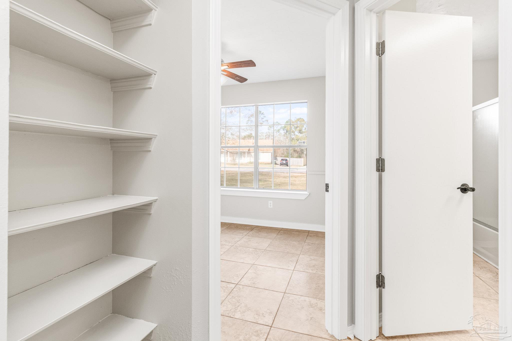 1655 Eagle Terrace Cantonment, FL 32533 - Photo 14 of 47 a view of an empty room with a window
