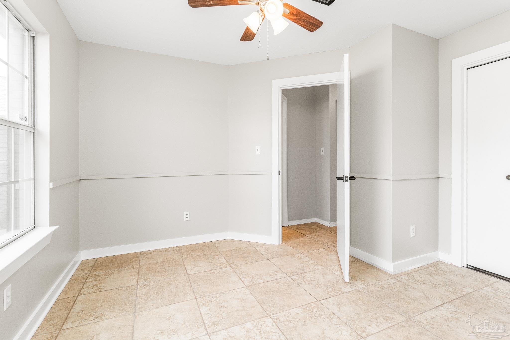 1655 Eagle Terrace Cantonment, FL 32533 - Photo 17 of 47 a view of an empty room with a window