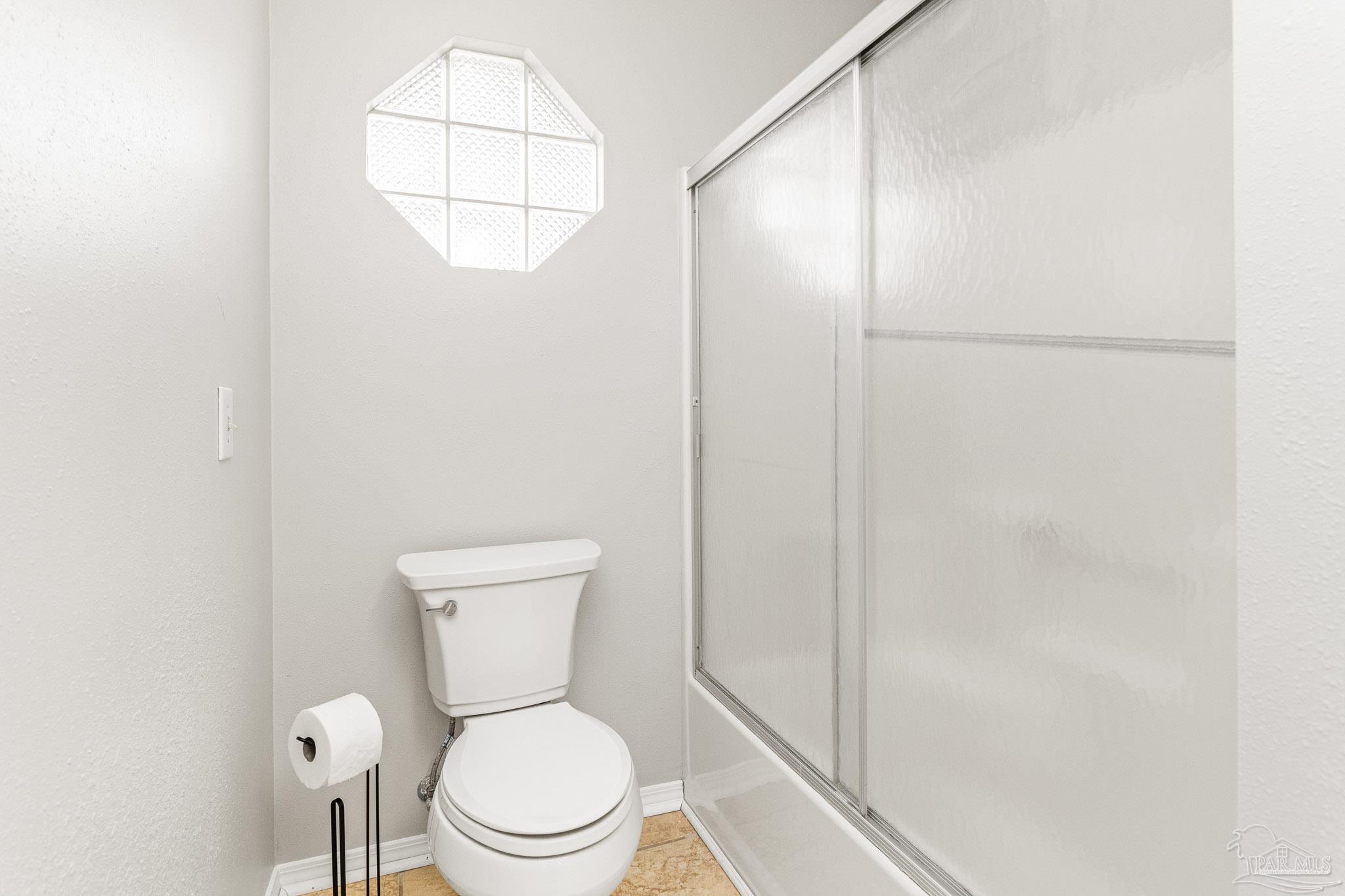 1655 Eagle Terrace Cantonment, FL 32533 - Photo 19 of 47 a white toilet sitting next to a bathroom sink