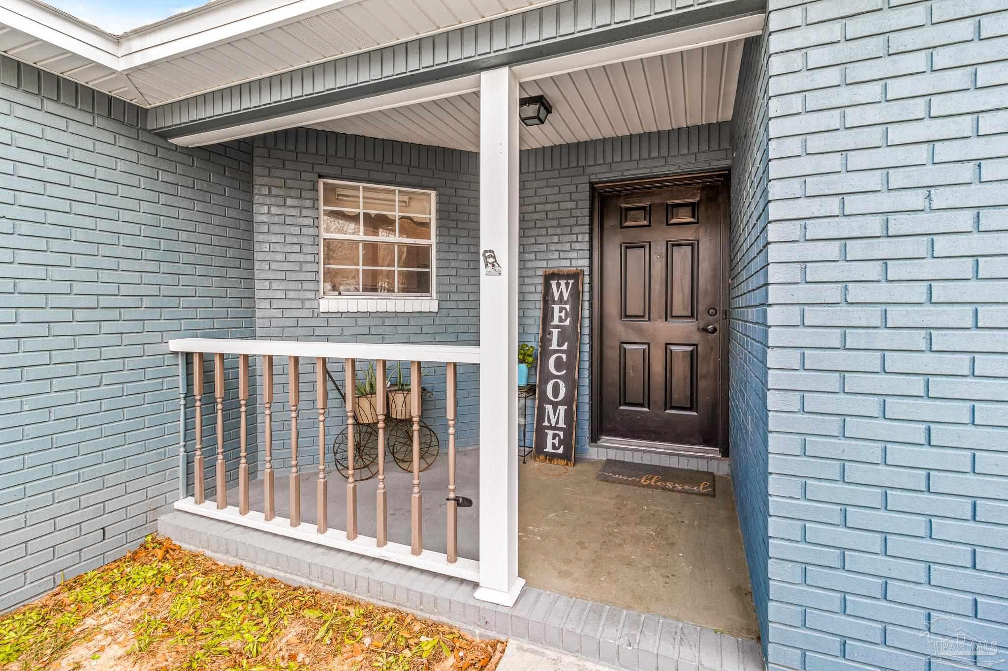 1655 Eagle Terrace Cantonment, FL 32533 - Photo 3 of 47 a view of front door of house