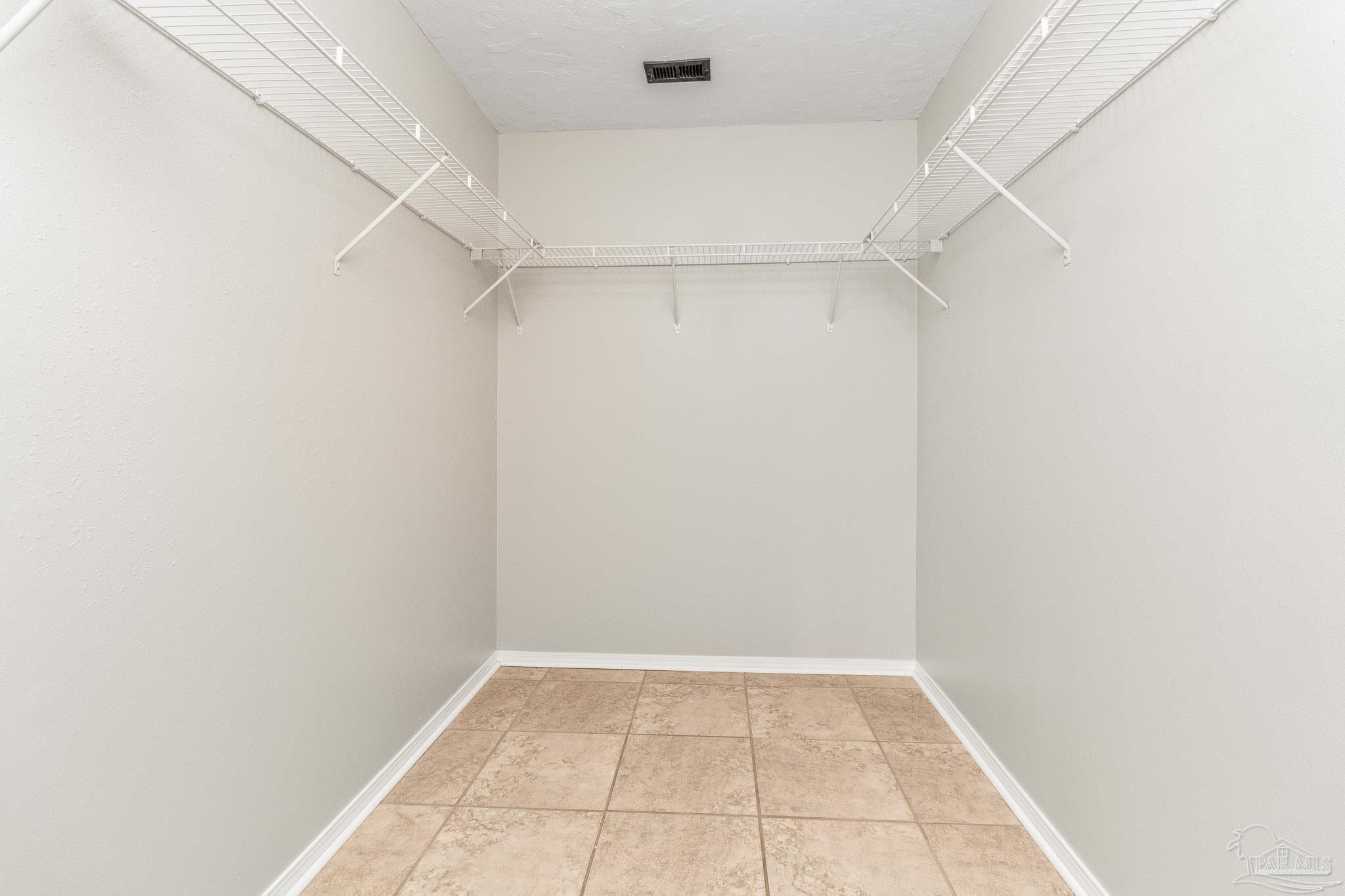 1655 Eagle Terrace Cantonment, FL 32533 - Photo 33 of 47 a view of a room with racks on the wall