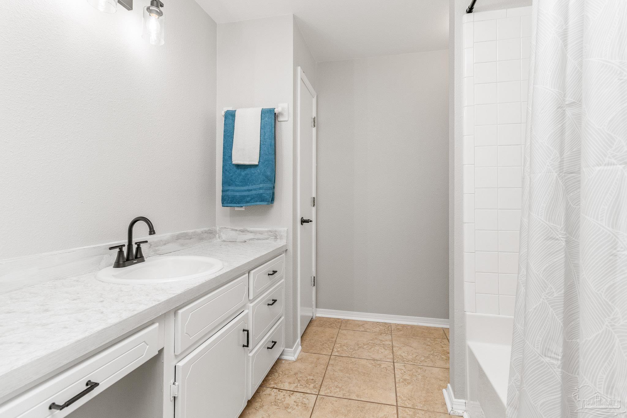 1655 Eagle Terrace Cantonment, FL 32533 - Photo 34 of 47 a bathroom with a sink and a mirror
