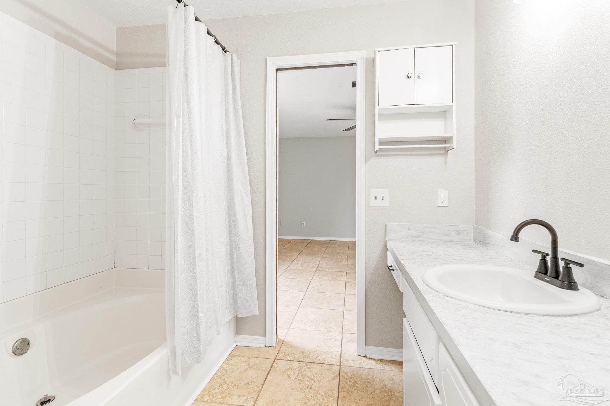 1655 Eagle Terrace Cantonment, FL 32533 - Photo 36 of 47 a bathroom with a sink and a mirror