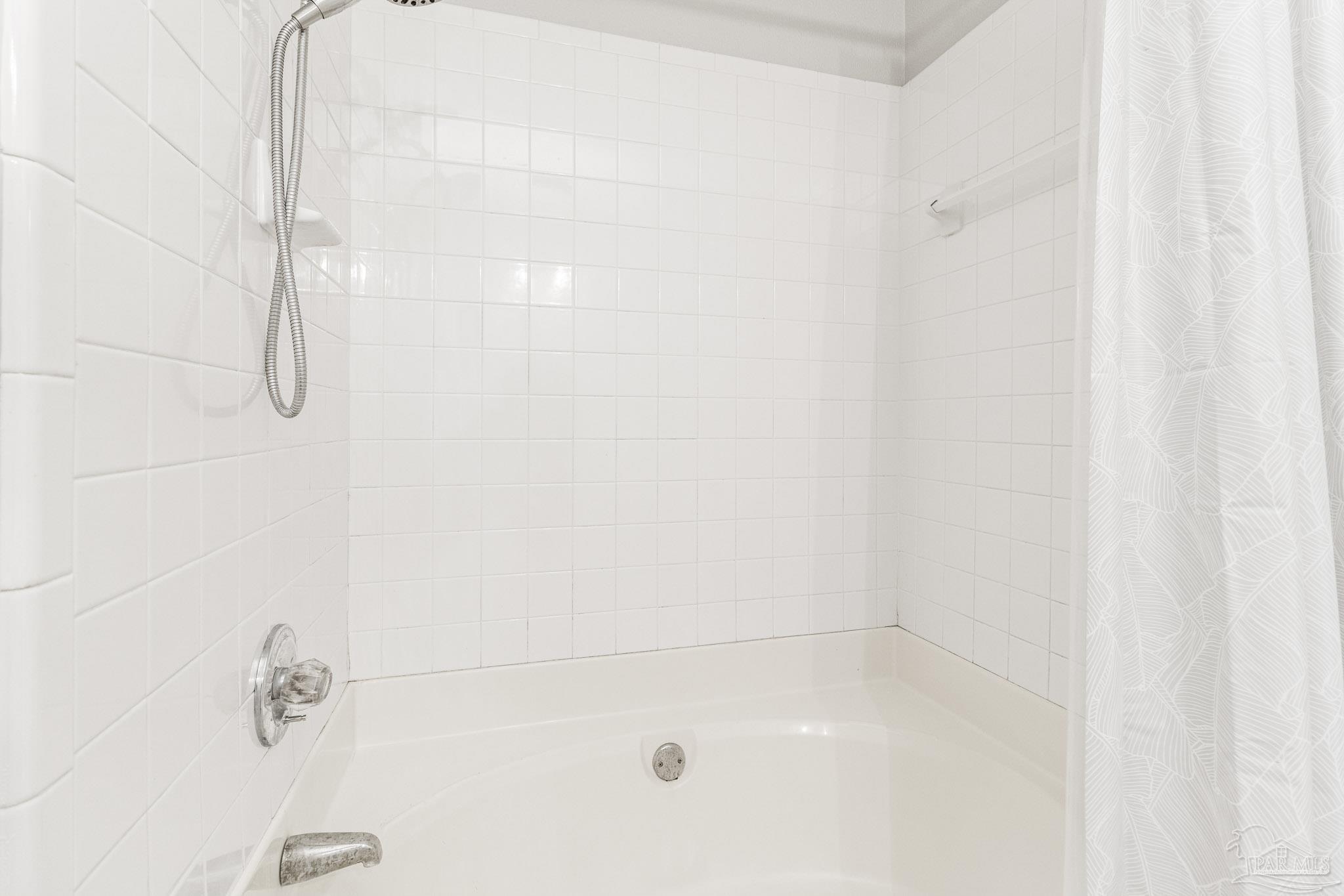 1655 Eagle Terrace Cantonment, FL 32533 - Photo 37 of 47 a close up of a bathtub