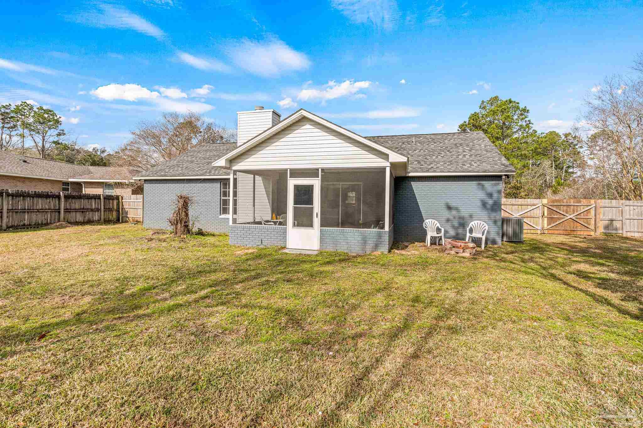 1655 Eagle Terrace Cantonment, FL 32533 - Photo 43 of 47 a view of a house with a swimming pool