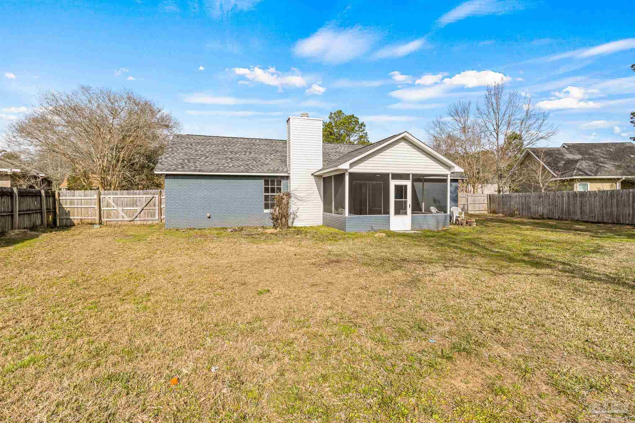 1655 Eagle Terrace Cantonment, FL 32533 - Photo 44 of 47 a front view of a house with a yard