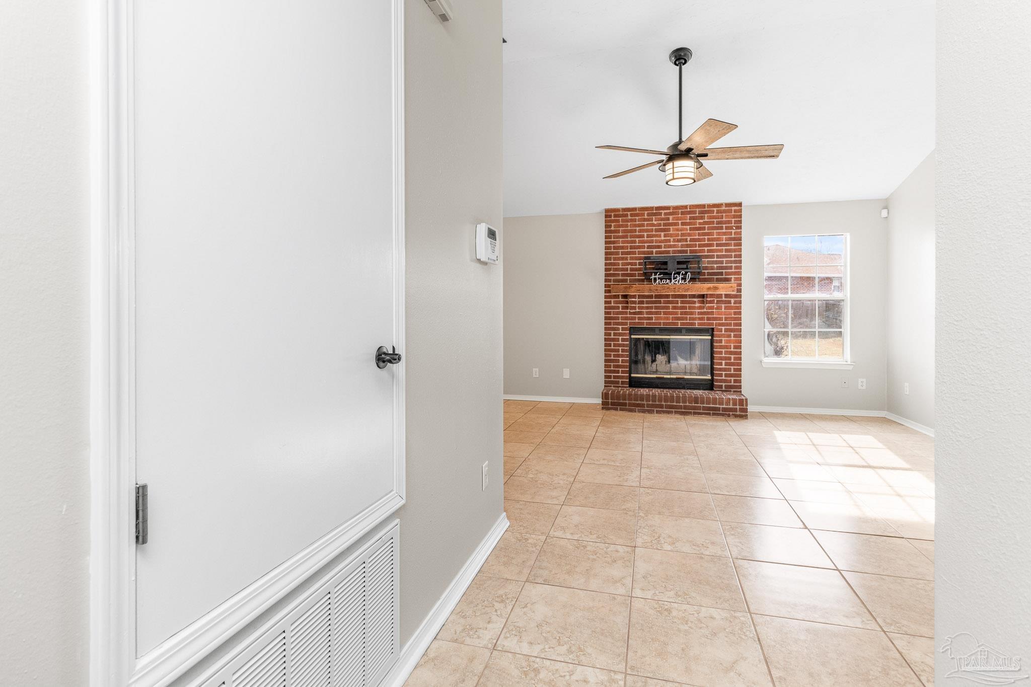 1655 Eagle Terrace Cantonment, FL 32533 - Photo 5 of 47 a view of a livingroom with a fireplace