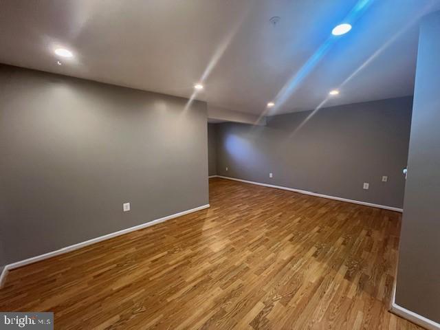 2622 Mill Race Road Frederick, MD 21701 - Photo 18 of 23 an empty room with wooden floor and windows