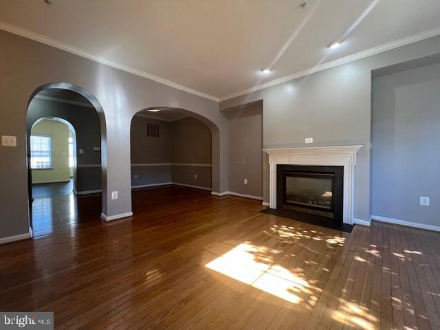 2622 Mill Race Road Frederick, MD 21701 - Photo 2 of 23 a view of empty room with wooden floor and fireplace