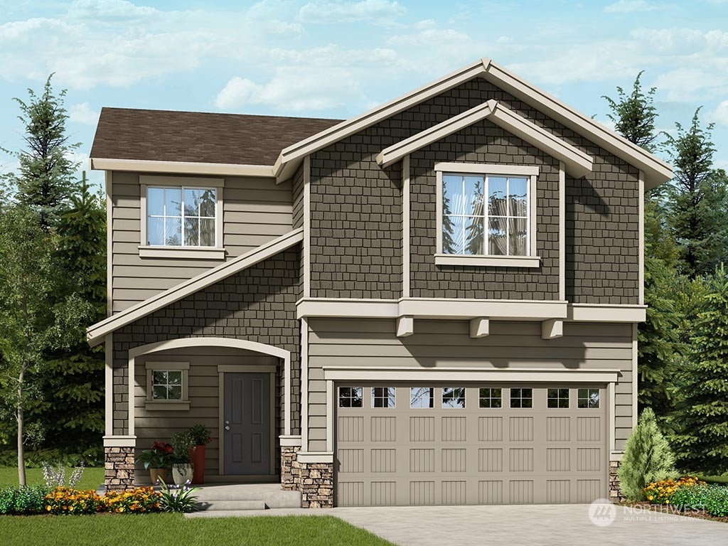 4426 228th Place South East, Unit MC2 Bothell, WA 98021 - Photo 1 of 30 a front view of a house with garden