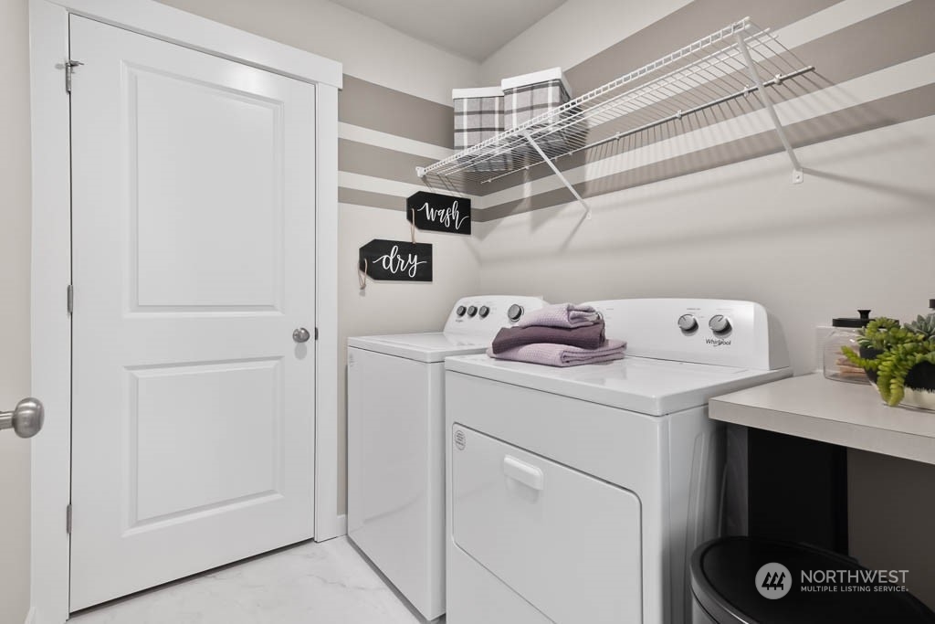 4426 228th Place South East, Unit MC2 Bothell, WA 98021 - Photo 24 of 30 a utility room with dryer and washer