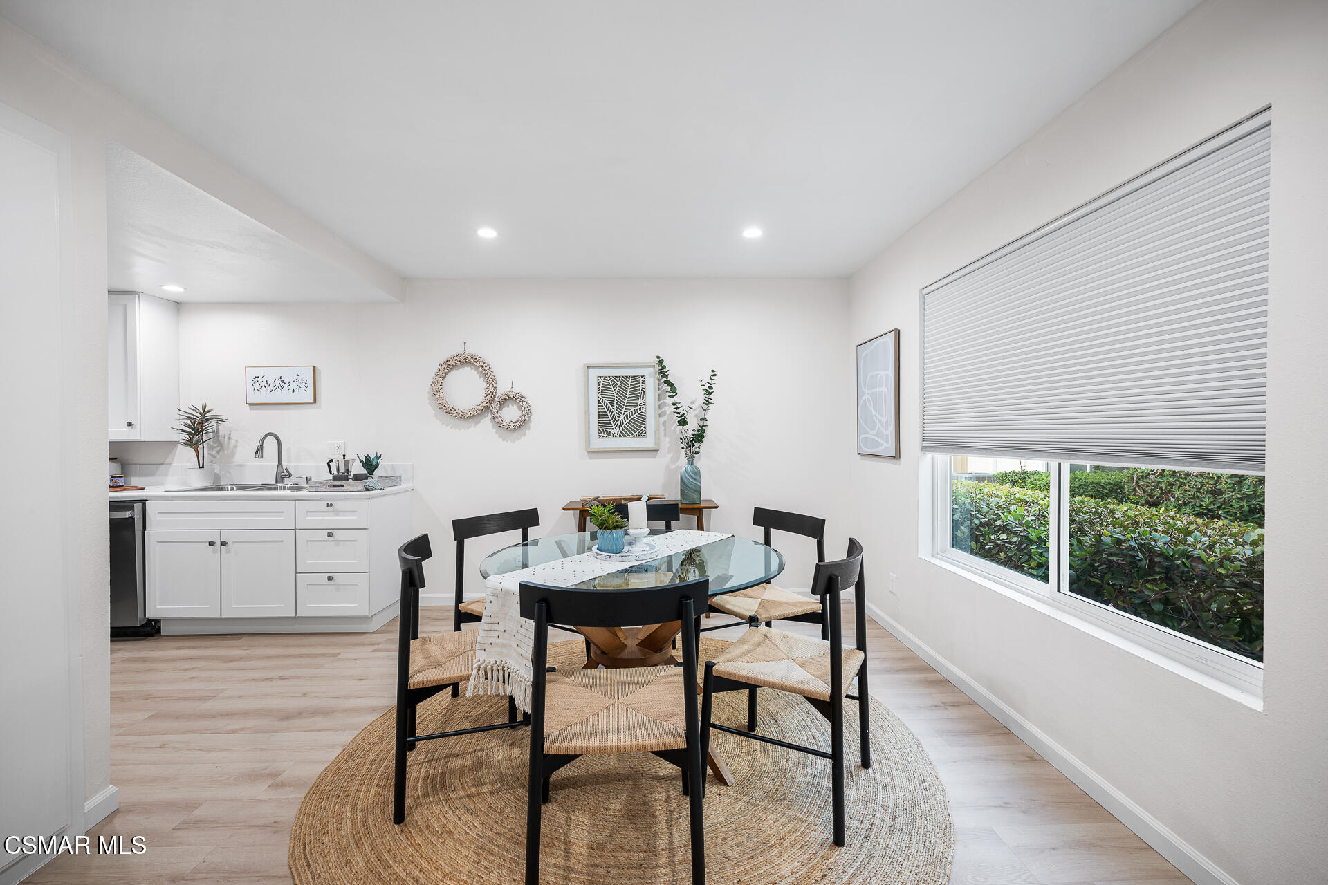577 Spring Road, Unit 54 Moorpark, CA 93021 - Photo 5 of 23 a view of a dining room with furniture and window