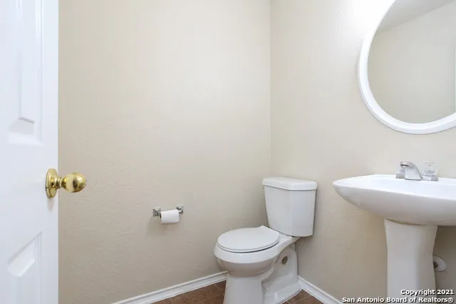 a bathroom with a sink and a toilet