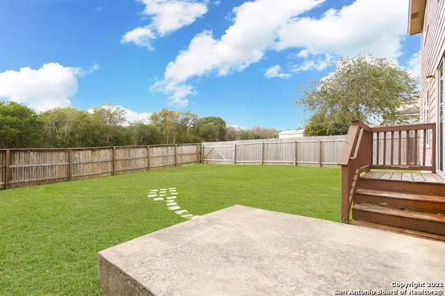 a view of a backyard with a garden