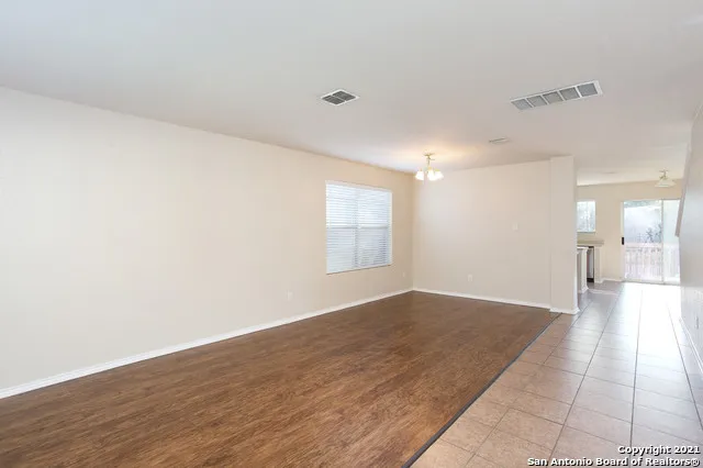 a view of an empty room and window