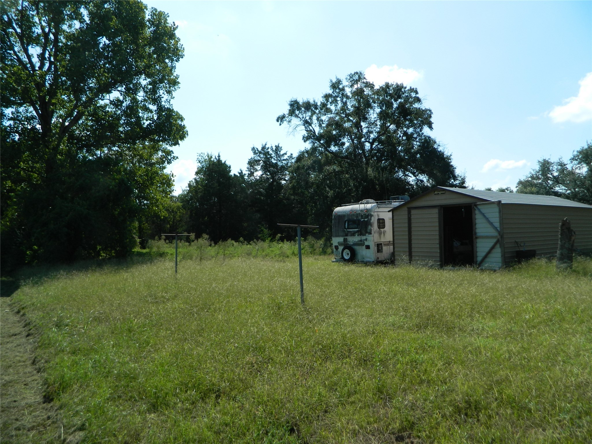 0 None Waller, TX 77484 - Photo 1 of 5 a house is sitting in middle od the grass