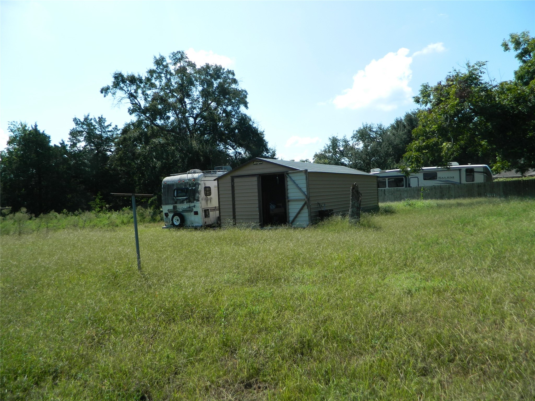 0 None Waller, TX 77484 - Photo 2 of 5 a view of a house with backyard and sitting area