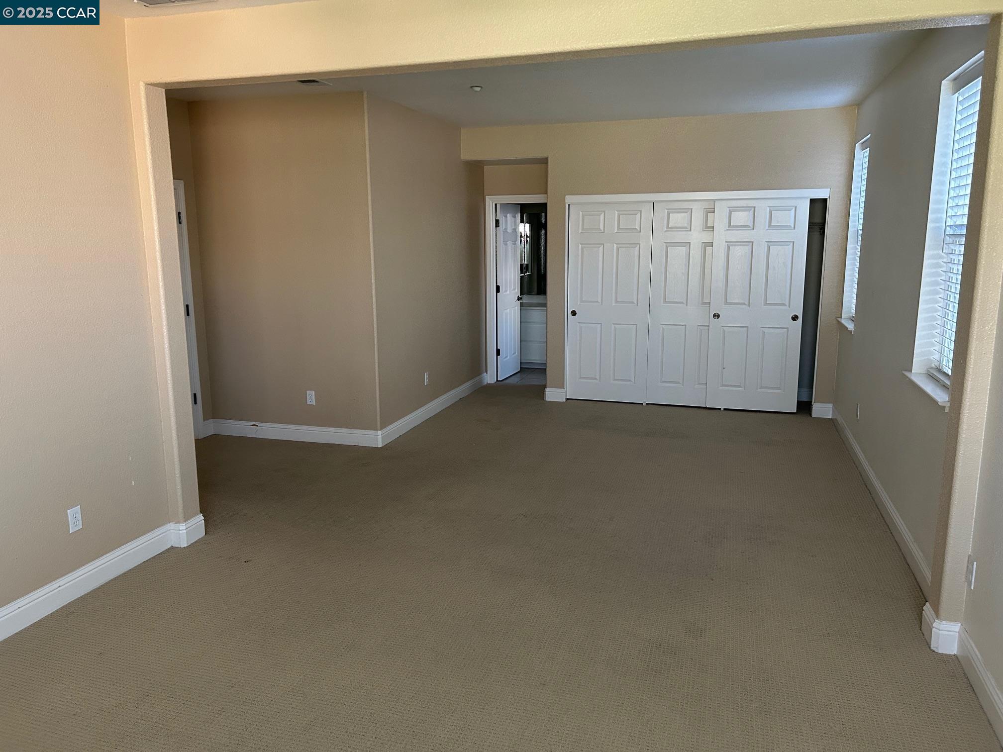 1849 Alexander Way Brentwood, CA 94513 - Photo 12 of 38 an empty room with windows