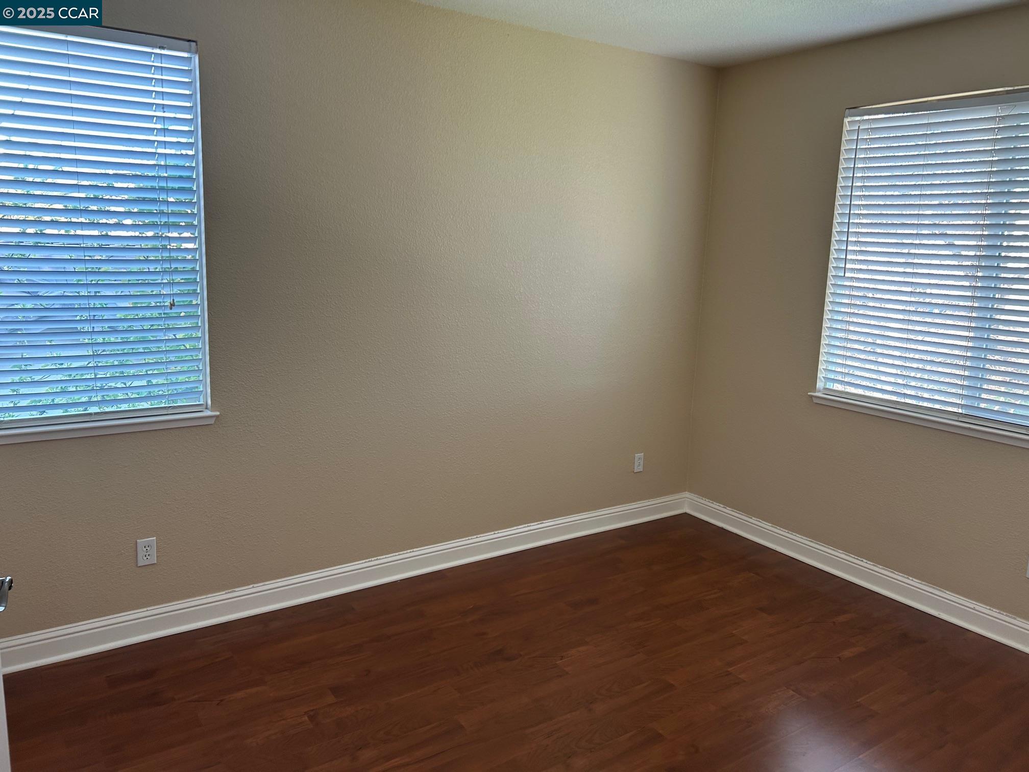 1849 Alexander Way Brentwood, CA 94513 - Photo 18 of 38 a view of a room with wooden floor and a window