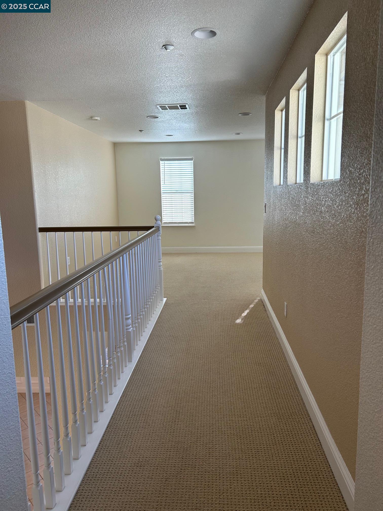 1849 Alexander Way Brentwood, CA 94513 - Photo 22 of 38 a view of hallway with stairs