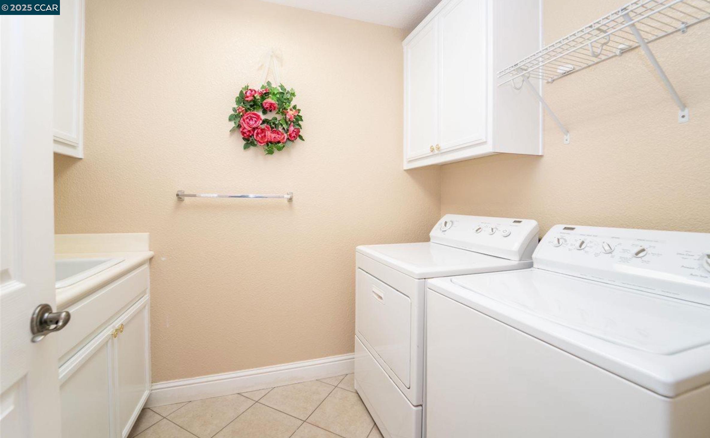 1849 Alexander Way Brentwood, CA 94513 - Photo 28 of 38 a utility room with dryer and washer